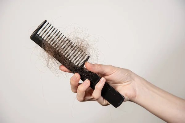 Female Hand Holds Black Comb Shreds Fallen Hair Her Head Stock Image