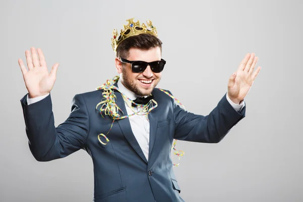 Young man in crown having fun — Stock Photo, Image