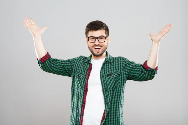 Man in groen gecontroleerd shirt heeft een idee — Stockfoto