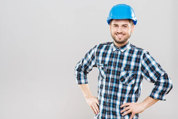Costruttore in casco blu da costruzione — Foto Stock