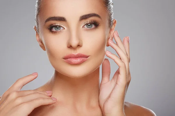 Beautiful girl with hands near face — Stock Photo, Image