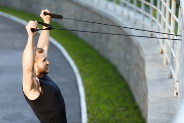 Adam çekerek genişletici