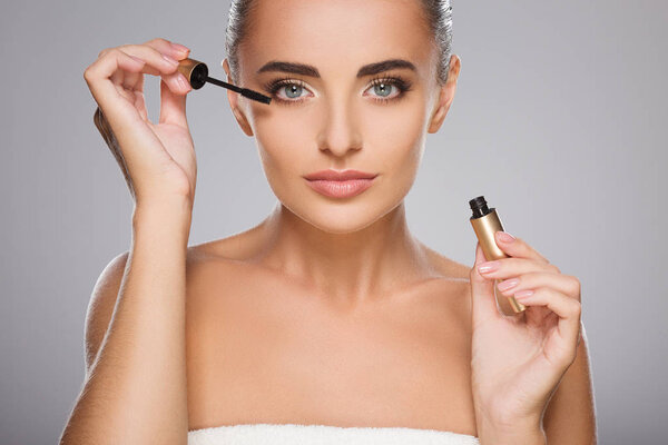 Lovely girl posing with mascara