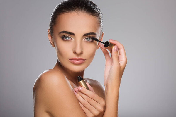 Lovely girl posing with mascara