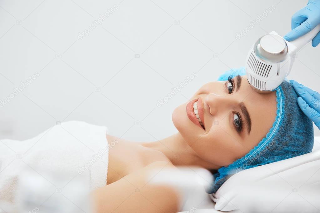woman  lying  in cosmetological clinic