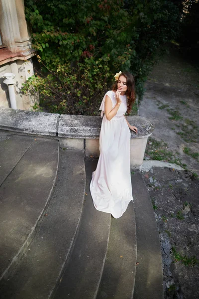 bride with  curly hair in wedding dress