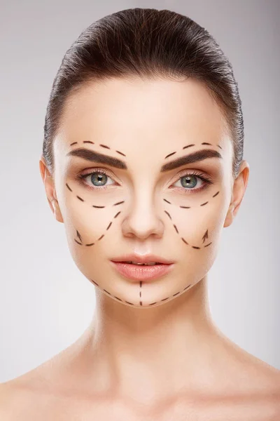 girl  with perforation lines on face