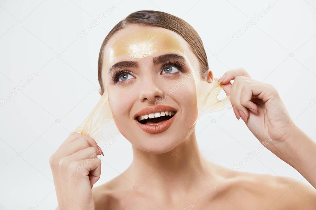 woman with yellow mask on face