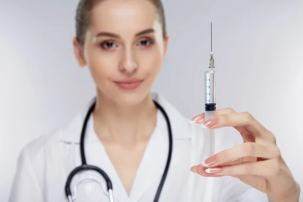 Beautiful young doctor with stethoscope — Stock Photo, Image