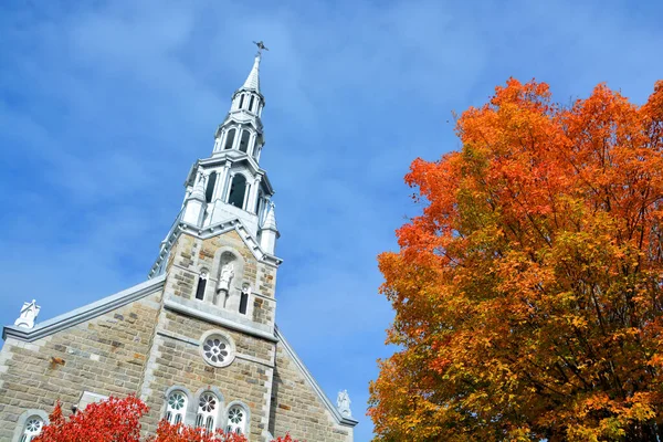 Old christian church in sunny autumn day