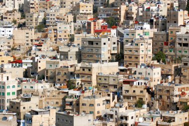 Amman Jordan 08 27 2009: Amman Ürdün 'ün başkenti ve en büyük şehridir. Ülkenin siyasi kültürel ve ticari merkezidir ve dünyada sürekli olarak en eski yerleşim merkezlerinden biridir.