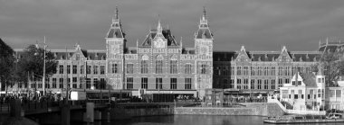 AMSTERDAM NETHERLAND OCTOBER 03 2015 Station Amsterdam Centraal is the largest railway station of Amsterdam, Netherlands, and a major national railway hub. Used by 260,000 passengers a day.