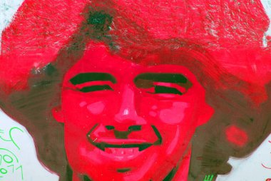 BUENOS AIRES NOV 24: Diego maradona graffiti on November 24, 2011 in Buenos Aires. The walls of the Argentine city enlivened by murals, whimsical painted figures, graffiti and stencils