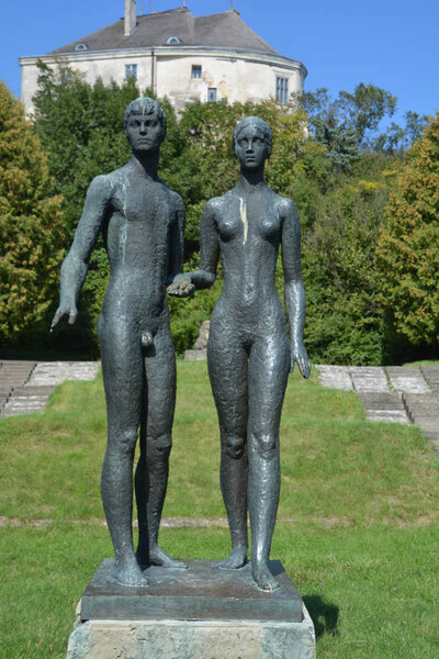 OLESKO UKRAINE 09 1417: Adam and Eve statue Olesko Castle is located within the borders of the present-day Busk Raion in Ukraine. Olesko Castle, oval in shape, stands on top of a small hill