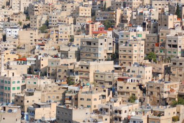 Amman Jordan 08 27 2009: Amman Ürdün 'ün başkenti ve en büyük şehridir. Ülkenin siyasi kültürel ve ticari merkezidir ve dünyada sürekli olarak en eski yerleşim merkezlerinden biridir.