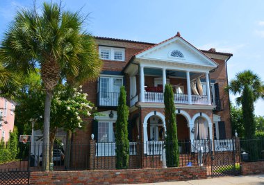 CHARLESTON SOUTH CAROLINA USA JUNE 27 2016: Historic houses along Battery st excellent example of 18th-century Georgian townhouse construction in Charleston, South Carolina