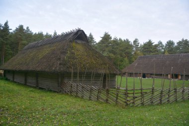 PUHALEPA PARISH HIIUMAA ESTONIA 09 19 2015: Old cottage-cum threshing barnon island of Hiimaa, Estonia.The old medieval village and huts
