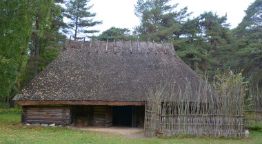 PUHALEPA PARISH HIIUMAA ESTONIA 09 19 2015: Old cottage-cum threshing barnon island of Hiimaa, Estonia.The old medieval village and huts