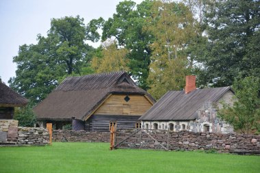 PUHALEPA PARISH HIIUMAA ESTONIA 09 19 2015: Old cottage-cum threshing barnon island of Hiimaa, Estonia.The old medieval village and huts