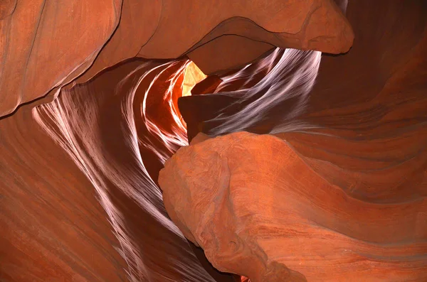 Antelope Canyon is a slot canyon in the American Southwest. It is on Navajo land east of Page, Arizona. Antelope Canyon includes two separate, scenic slot canyon sections