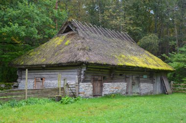 PUHALEPA PARISH HIIUMAA ESTONIA 09 19 2015: Old cottage-cum threshing barnon island of Hiimaa, Estonia.The old medieval village and huts