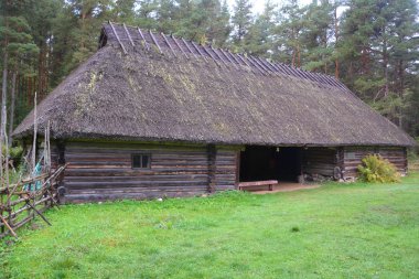 PUHALEPA PARISH HIIUMAA ESTONIA 09 19 2015: Old cottage-cum threshing barnon island of Hiimaa, Estonia.The old medieval village and hut