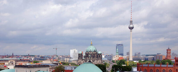 BERLIN GERMANY 09 24 17: Berlin Cathedral is the short name for the Evangelical Supreme Parish & Fernsehturm (Television Tower) located at Alexanderplatz.