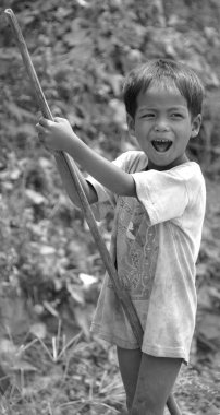 Phnom Phen, Kamboçya 23 Mart 2013: Sadece Phnom Phen, Kamboçya 'da tanımlanamayan sokak çocukları poz veriyor. Sadece Phnom Penh' de 10 ila 20 bin arasında çocuk yaşıyor ve sokaklarda çalışıyor.