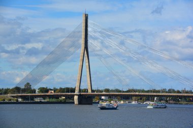 RIGA LATVIA SEPTEMBER 18 2015: The Vansu Bridge in Riga is a cable-stayed bridge that crosses the Daugava river in Riga