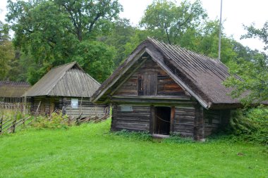 PUHALEPA PARISH HIIUMAA ESTONIA 09 19 2015: Old cottage-cum threshing barnon island of Hiimaa, Estonia.The old medieval village and huts