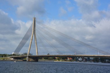 RIGA LATVIA SEPTEMBER 18 2015: The Vansu Bridge in Riga is a cable-stayed bridge that crosses the Daugava river in Riga