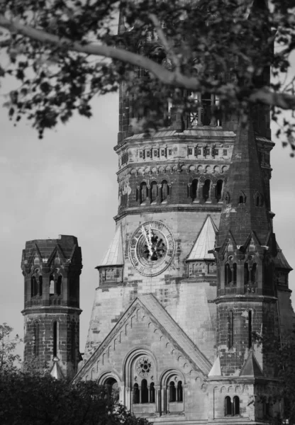 BERLIN GERMANY 05 22 2010: The Kaiser Wilhelm Memorial Church is one of Berlin's most famous landmarks. The damaged tower is a symbol of Berlin's resolve to rebuild the city