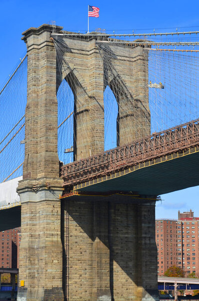 NEW YORK CITY NY 10 29 13 : Brooklyn Bridge is one of the oldest suspension bridges in the US. Completed in 1883, it connects the New York City boroughs of Manhattan and Brooklyn by spanning the East