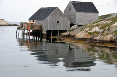 Peggy 's Cove Nova Scotia 6 Haziran: Peggy' s Cove 'daki tipik balıkçı kulübesi 6 Haziran 2014 tarihinde Nova Scotia' daki St. Margarets Körfezi 'nin doğu kıyısında yer alan küçük bir kırsal topluluk..