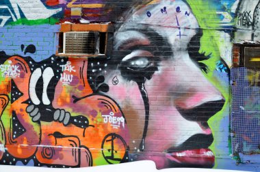 MONTREAL CANADA MARCH 30: Street art Montreal on march 30 2014 in Montreal Canada. Montreal. is the perfect place to walk in the back alleys and abandoned areas, looking for fresh air and street art. 