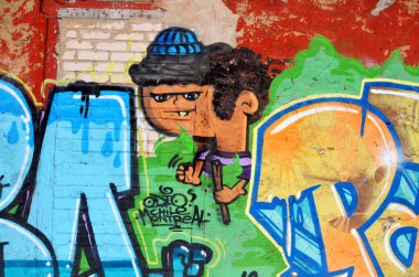 MONTREAL CANADA MARCH 30: Street art Montreal on march 30 2014 in Montreal Canada. Montreal. is the perfect place to walk in the back alleys and abandoned areas, looking for fresh air and street art. 