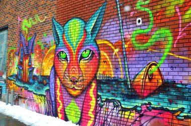MONTREAL CANADA MARCH 30: Street art Montreal on march 30 2014 in Montreal Canada. Montreal. is the perfect place to walk in the back alleys and abandoned areas, looking for fresh air and street art.