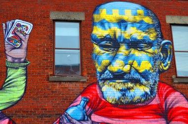 Montreal CANADA Mart 30: Montreal kart oyuncuları 30 Mart 2014 tarihinde Montreal Kanada 'da. Montreal. Arka sokaklarda ve terk edilmiş alanlarda sokak sanatına bakarak yürümek için mükemmel bir yer.. 