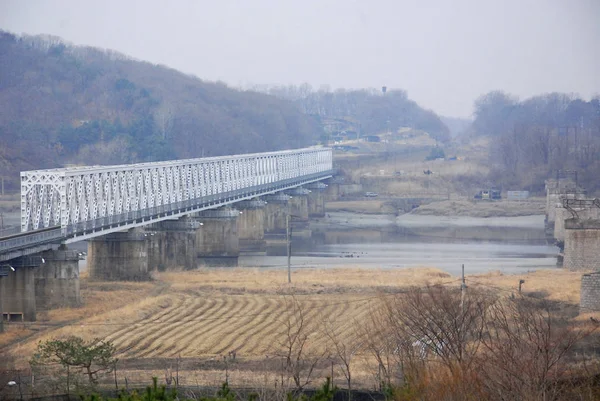 PAJU SOUTH KOREA APRIL 5: The Freedom bridge does actually cross the Imjin river, it is a former railroad bridge which was used by POWs/soldiers returning from the north.on april 5 2013 in South Korea