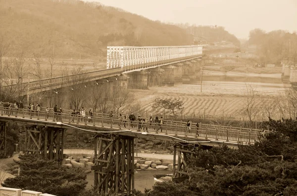 PAJU, SOUTH KOREA - APRIL 5: The Freedom bridge does actually cross the Imjin river, it is a former railroad bridge which was used by POWs/soldiers returning from the north.on april 5 2013 in South Korea