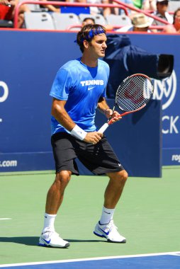 5 Ağustos 2011 'de Montreal, Kanada' da Roger Federer, Montreal Rogers Kupası sahasında. Roger Federer, 237 haftalık rekorunu elinde tutan İsviçreli profesyonel tenis oyuncusu.