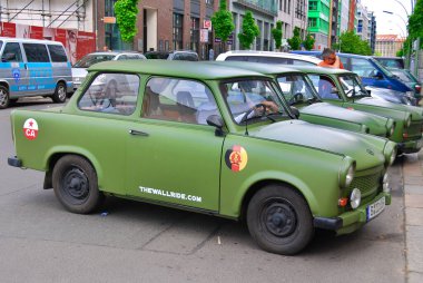 BERLIN, GERMANY - MAY 22: Famous Trabant car in front the GDR musuem on May 22, 2010 in Berlin, Germany. The Trabant is a car that was produced by former East German auto maker VEB in Zwickau. clipart