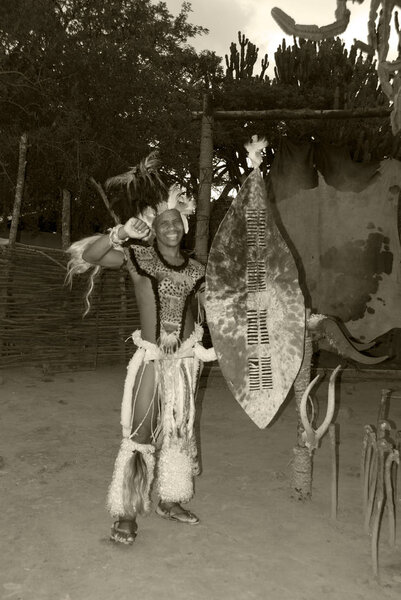 SAKALAND - NOVEMBER 27 : Unidentified Zulu dancers wear traditional Zulu clothing, during presentation of a Zulu show on November 27, 2010 Shakaland Zulu Cultural Village, KwaZulu-Natal, South Africa