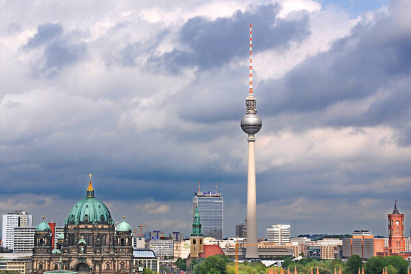 BERLIN GERMANY - 09 24 17: Berlin Cathedral is the short name for the Evangelical Supreme Parish & Fernsehturm (Television Tower) located at Alexanderplatz.