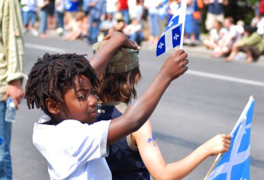 MONTREAL CANADA - 06, 24: Quebec 'in Ulusal Bayramını (Fransızca: La Fete nationale du Quebec) kutlayan tanımlanamayan kişiler, her yıl 24 Haziran, Vaftizci Aziz John Günü, 06-24 Montreal