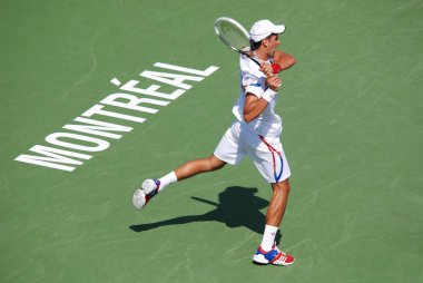 MONTREAL - 7 AUGust: Novak Cokoviç 7 Ağustos 2011 'de Montreal, Kanada' da düzenlenen Montreal Rogers Kupası sahasında. Novak Cokoviç, Dünya No. 1