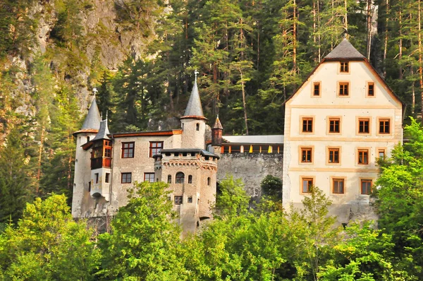 NASSEREIT AUSTRIA - AUG 1: castle and hotel Fernsteinsee on Aug 1 2009 in Nassereit Austria. The castle from the 14 th century is situated at a famous travel route used even at roman times.