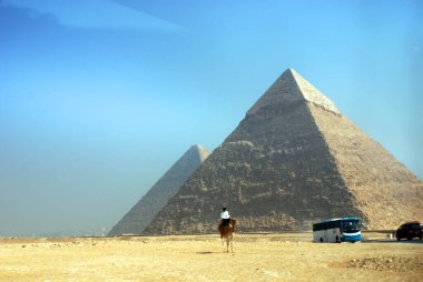 CAIRO EGYPT - 11 22 10: Great Pyramid of Giza also known as the Pyramid of Khufu or the Pyramid of Cheops is the oldest and largest of the three pyramids in the Giza pyramid clipart