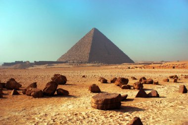 The Great Pyramid of Giza also known as the Pyramid of Khufu or the Pyramid of Cheops is the oldest and largest of the three pyramids in the Giza pyramid complex bordering what is now El Giza, Egypt clipart