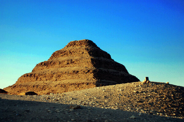 SAQQARA EGYPT - NOVEMBER 22: Ancient step pyramid in Saqqara, Egypt on november 22 2010 The number of tourists visiting Egypt dropped by more than a third since the Egyptian revolution on Jan 25 2011.